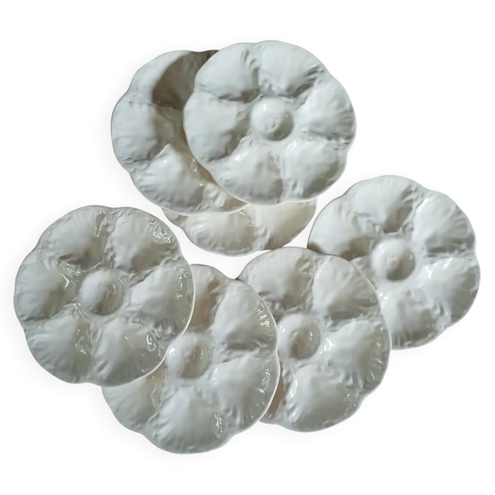 7 assiettes à huitres anciennes Gien