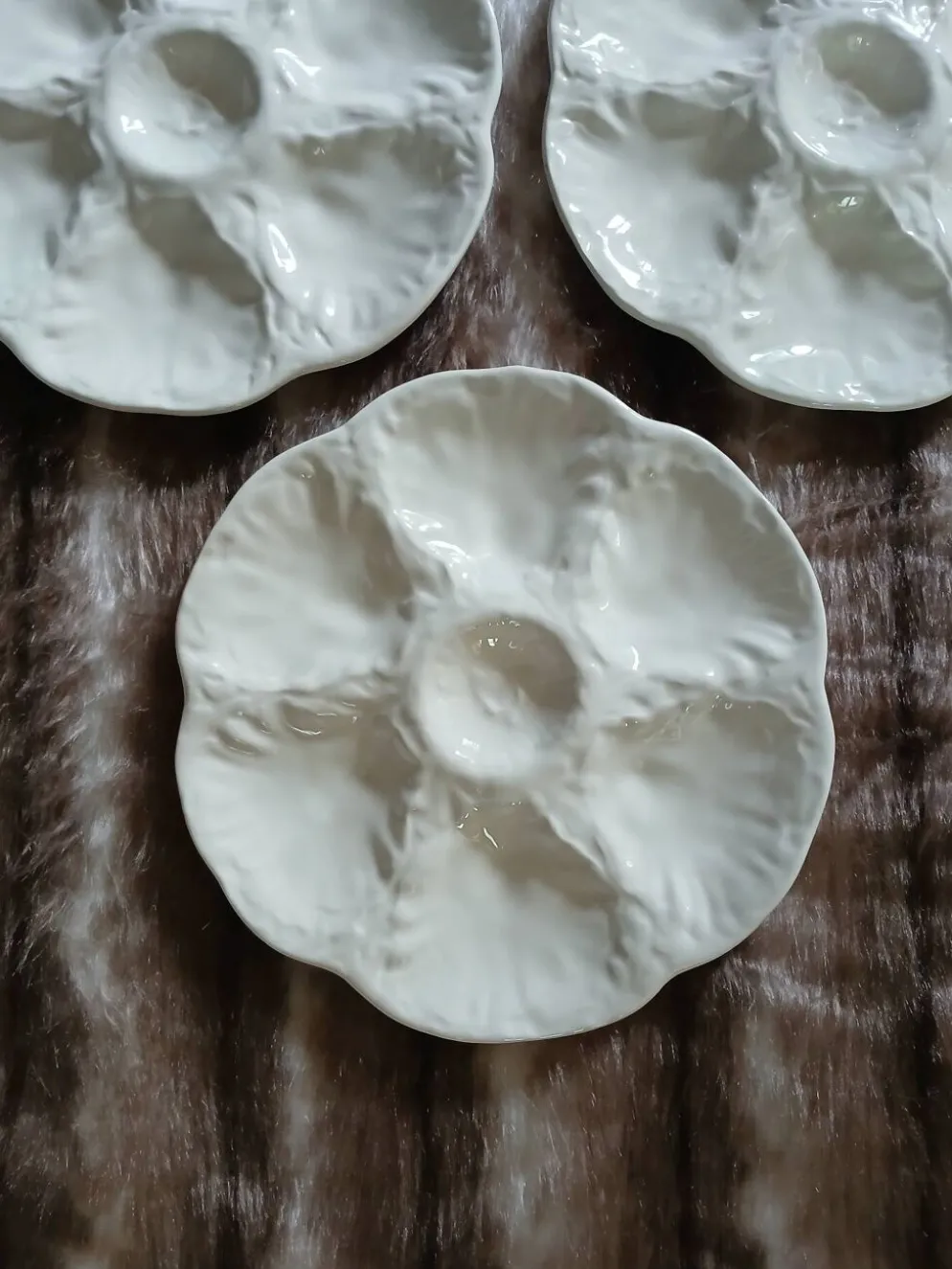 7 assiettes à huitres anciennes Gien