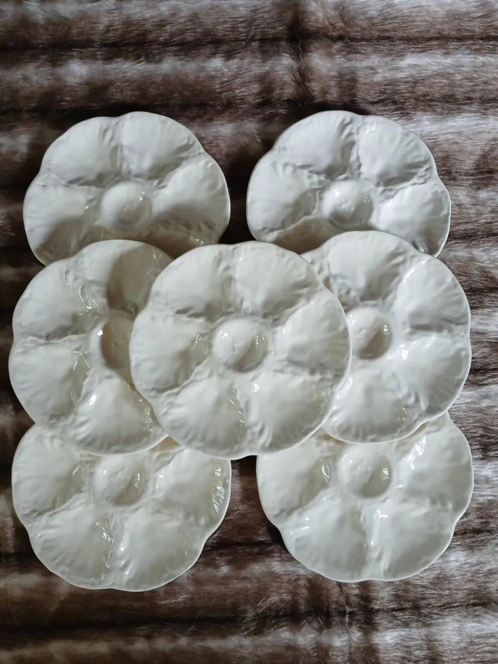 7 assiettes à huitres anciennes Gien