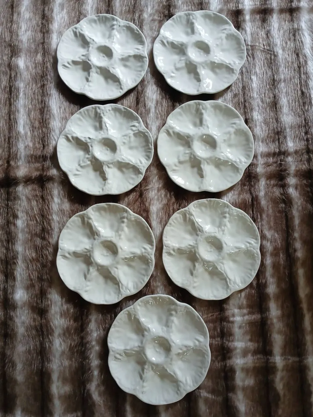 7 assiettes à huitres anciennes Gien