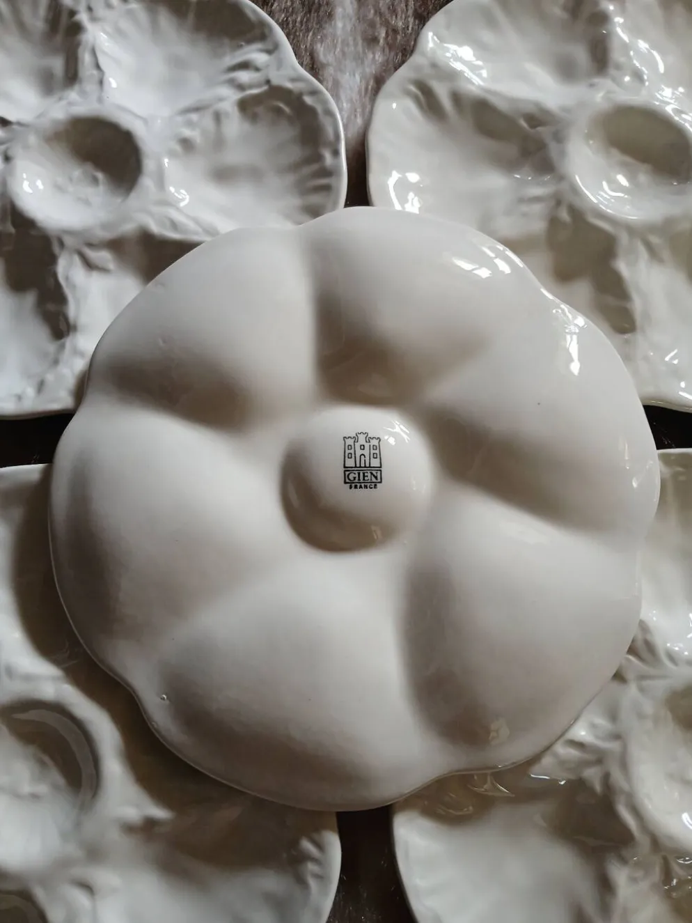 7 assiettes à huitres anciennes Gien