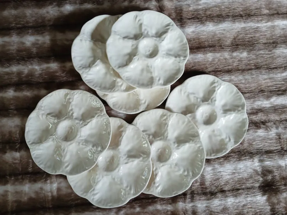 7 assiettes à huitres anciennes Gien