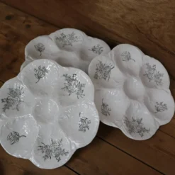 9 Assiettes à huîtres décor fleuri noir KetG Luneville année 1940
