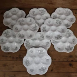 9 Assiettes à huîtres décor fleuri noir KetG Luneville année 1940