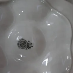 9 Assiettes à huîtres décor fleuri noir KetG Luneville année 1940