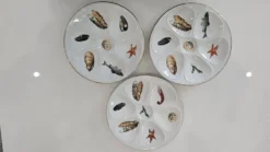 6 assiettes à huîtres en porcelaine de Limoges Lourioux et LF