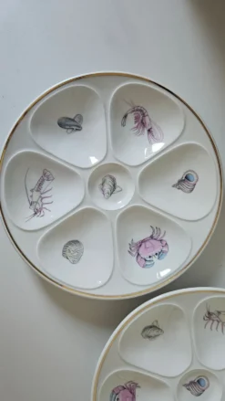 6 assiettes à huîtres en porcelaine de Limoges Lourioux et LF