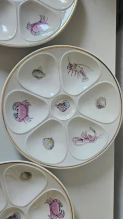 6 assiettes à huîtres en porcelaine de Limoges Lourioux et LF
