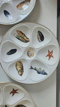 6 assiettes à huîtres en porcelaine de Limoges Lourioux et LF