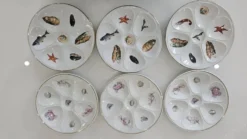 6 assiettes à huîtres en porcelaine de Limoges Lourioux et LF