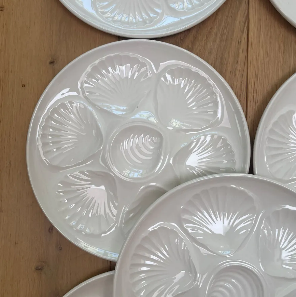 10 assiettes à huîtres Le Printemps Paris