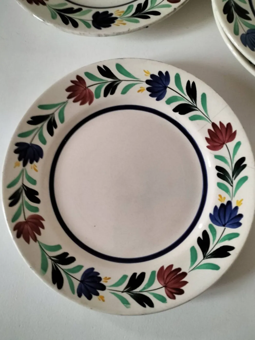 4 assiettes Longchamp décor floral stylisé années 30-50