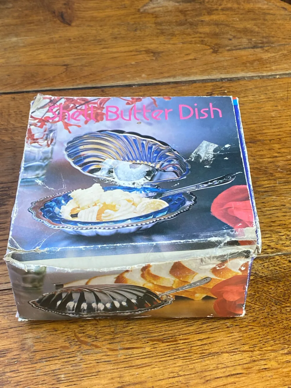Beurrier coquillage en inox et verre bleu
