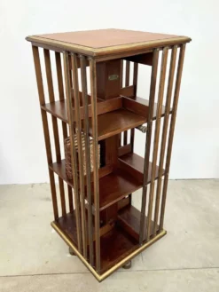 Bibliothèque tournante acajou et laiton — G. Borgeaud, circa 1900