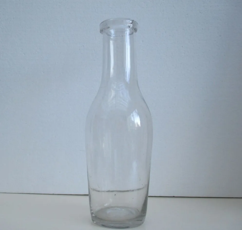 Bouteille ancienne en verre soufflé