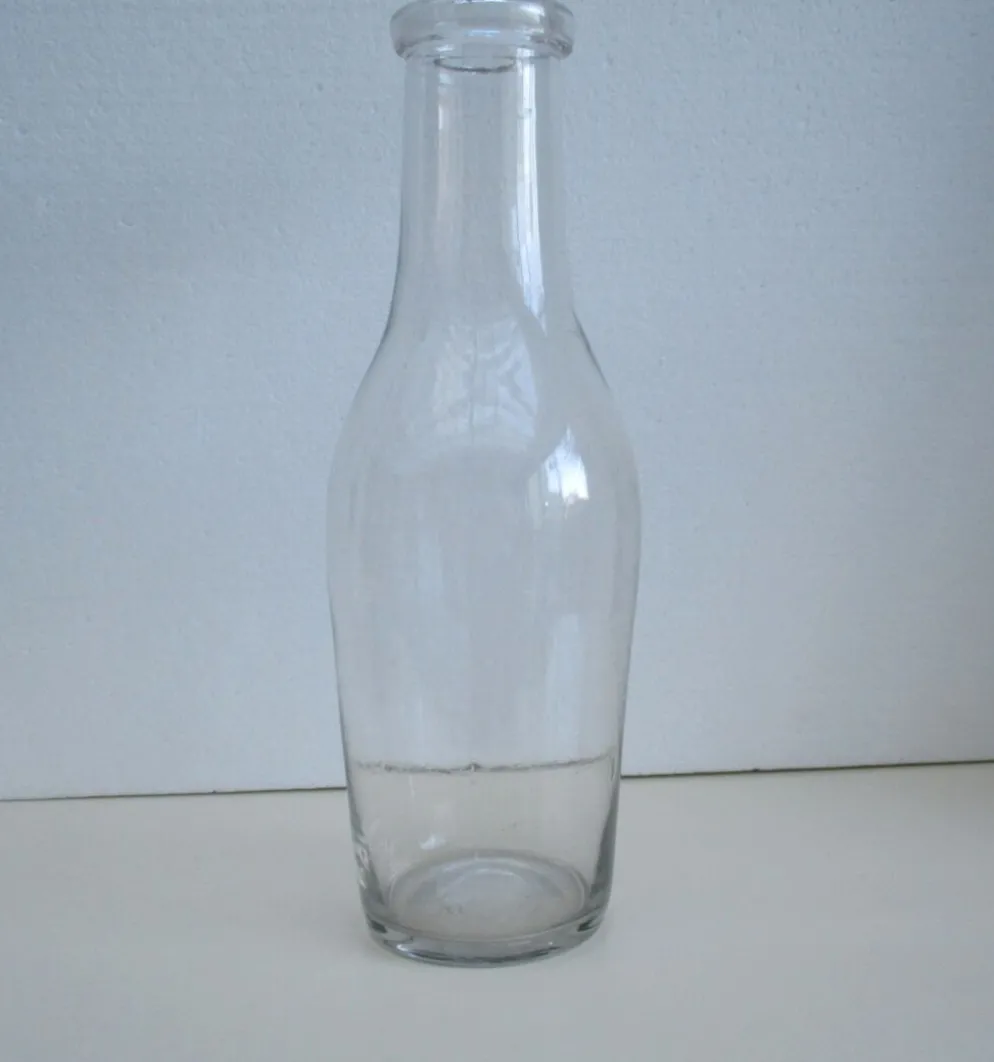Bouteille ancienne en verre soufflé