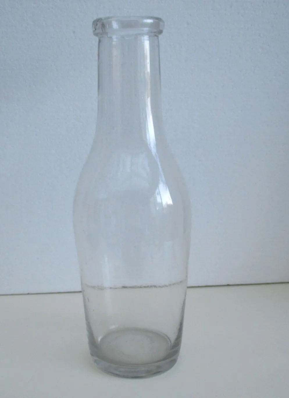 Bouteille ancienne en verre soufflé