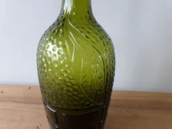 Bouteille ancienne verte fantaisie