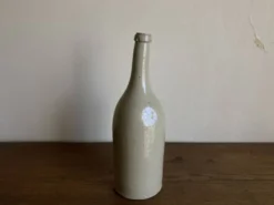 Bouteille de grès penchée début 20e