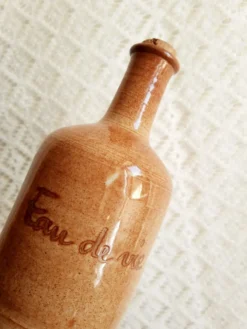 Bouteille eau de vie en grès Mongolfier vintage