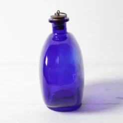 Bouteille en verre du milieu du siècle avec bouchon en pièce / Ruda Glasbruk / Suède / années 1970