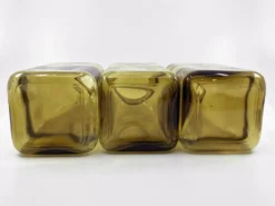 3 bouteilles de pharmacie en verre ambré moulé • bouchons bakélite • 1950