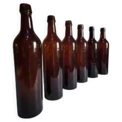 6 bouteilles de vin bordelaises anciennes en verre rubis-brun, France XIXe siècle