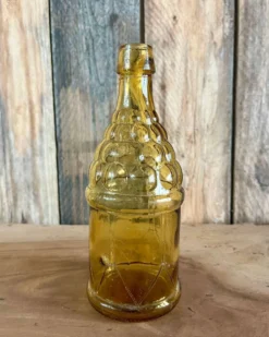 Bouteille 70s en verre jaune