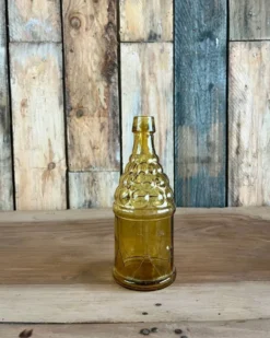 Bouteille 70s en verre jaune