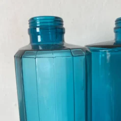 Bouteilles en verre turquoise 36 cm , verrerie de Fougère