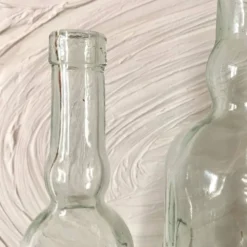 Bouteilles vintage mains Italie