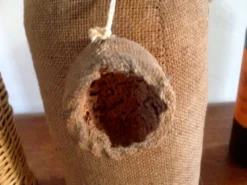 Bouteille vintage en toile de jute