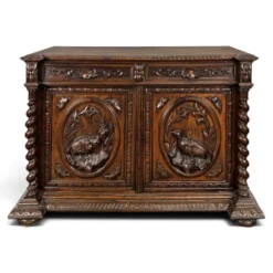 Buffet de chasse de style Henri II en chêne sculpté à colonnes torsadées