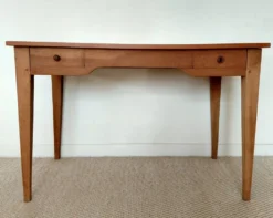 Bureau ancien à double tiroir, pieds gainés, XIXème
