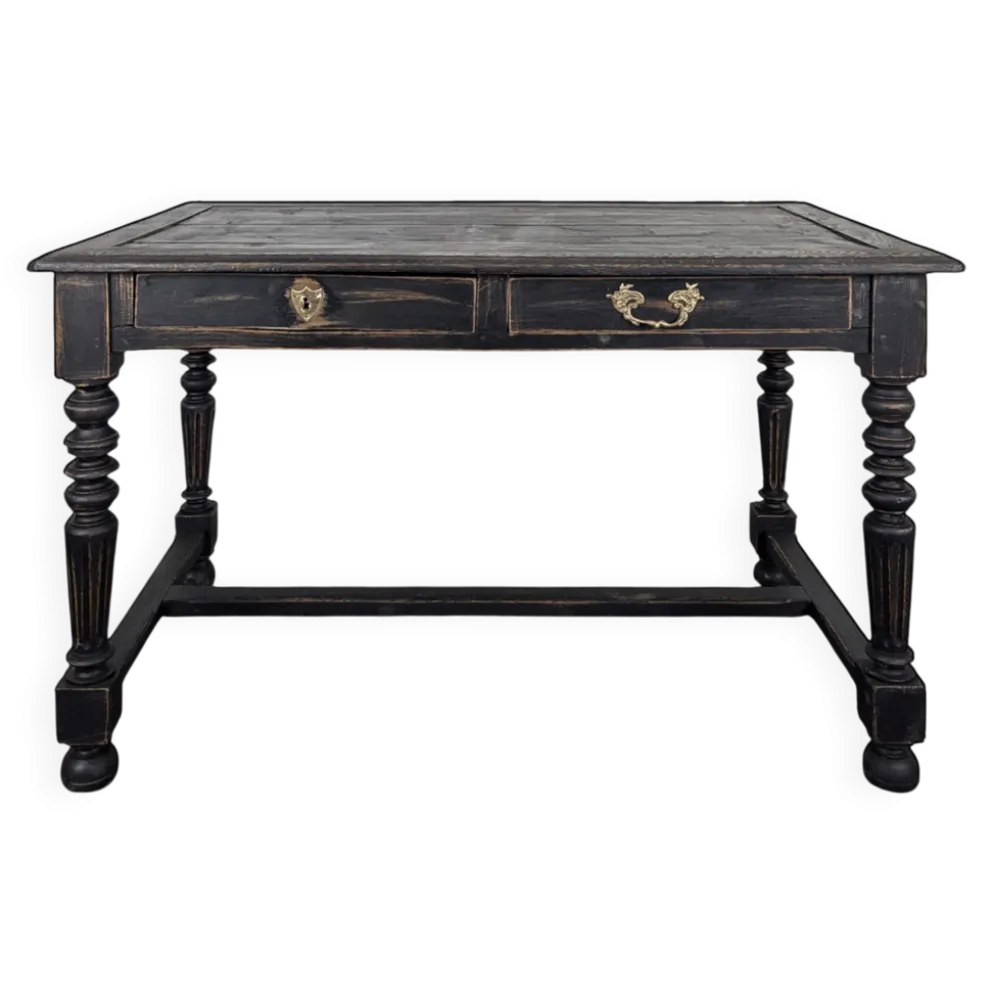 Bureau de style Louis XIII en bois noirci pieds tournés deux tiroirs