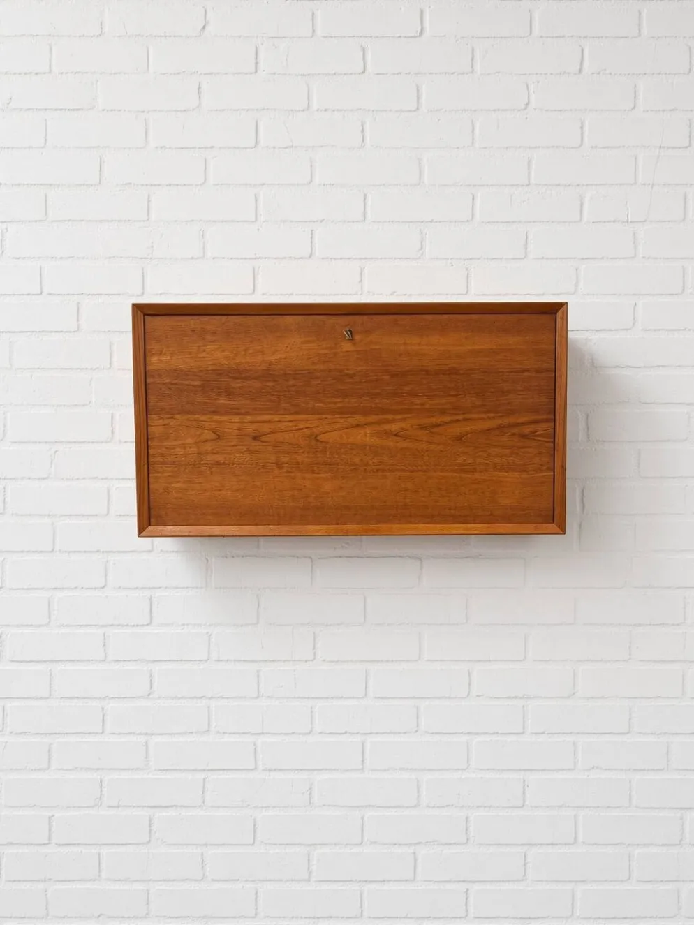 Cabinet de bar en teck par Poul Cadovius pour Cado, années 1960.