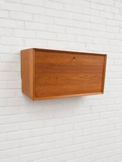 Cabinet de bar en teck par Poul Cadovius pour Cado, années 1960.