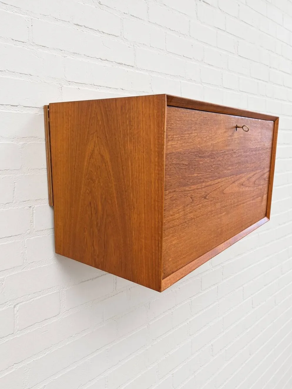 Cabinet de bar en teck par Poul Cadovius pour Cado, années 1960.