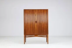 Cabinet haut danois en teck avec portes tambour Danemark 1960