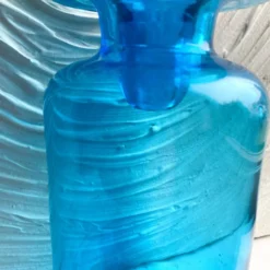 Carafe en verre bouchon boule années 70