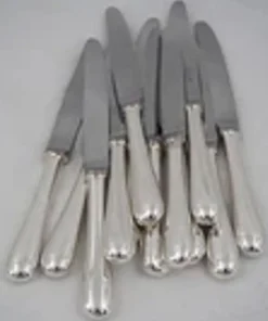 Christofle Baguette, 12 couteaux à entremets, dessert, fromage en parfait état.