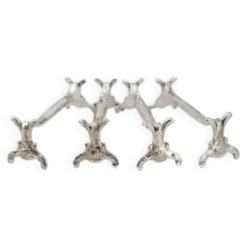 Christofle Chrysanthème, 4 porte-couteaux en métal argenté, excellent état.