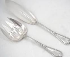 Christofle modèle Rubans Clochettes couvert de service à poisson métal argenté, 2 pièces.