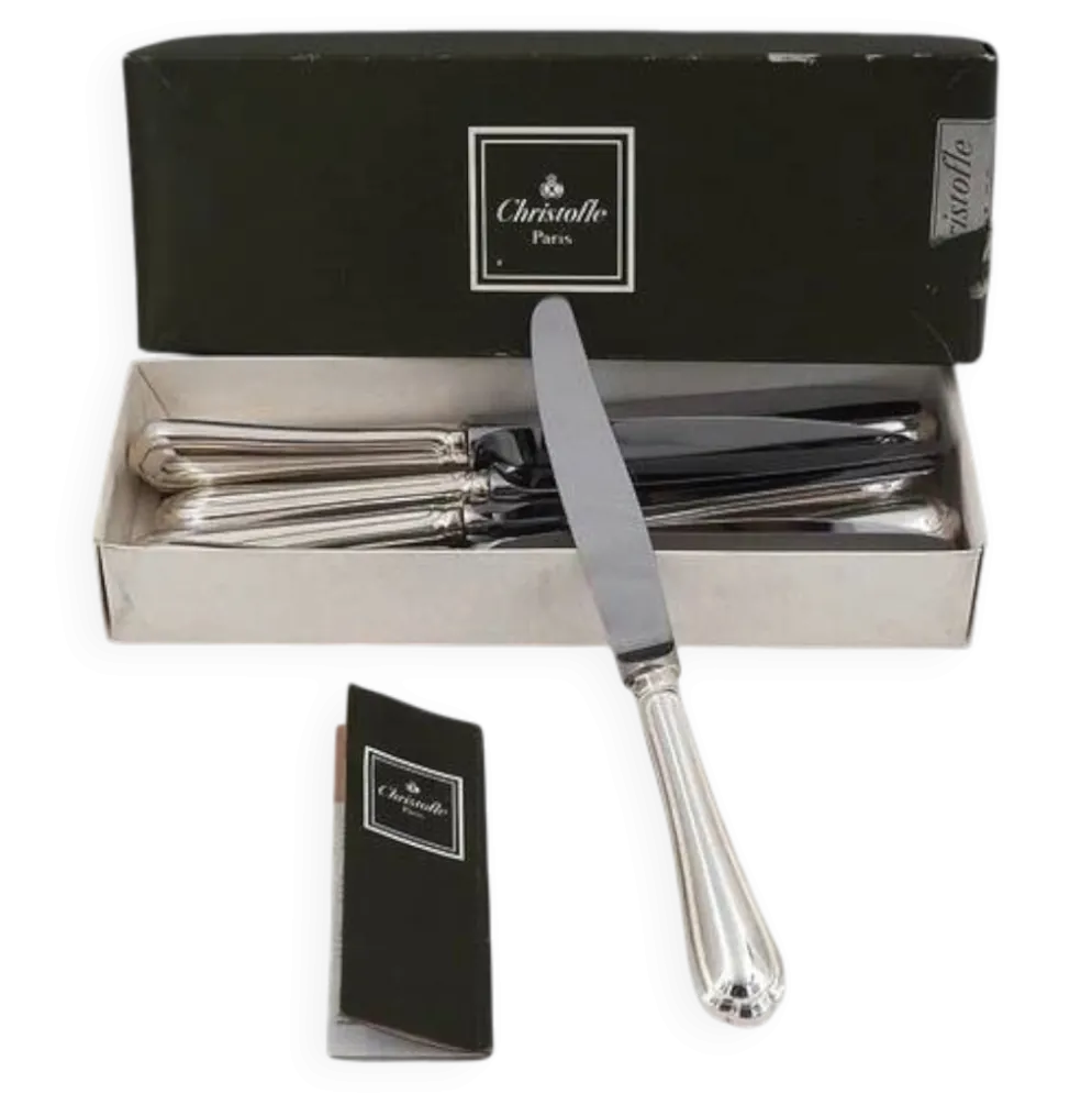 Christofle Spatours, 12 couteaux de table en métal argenté, en excellent état.