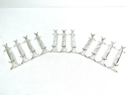 Christofle - série de 11 porte-couteaux en métal argenté