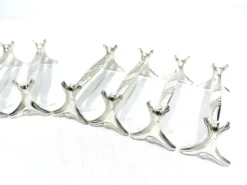 Christofle - série de 11 porte-couteaux en métal argenté