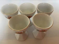 Cinq anciens coquetiers fleurs oranges et grises pied polygone