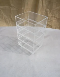 Coffre à roulettes et tiroirs plexiglas