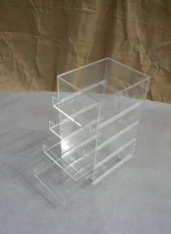 Coffre à roulettes et tiroirs plexiglas