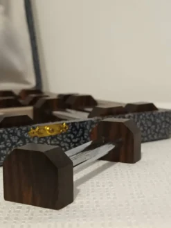 Coffret de 12 porte-couteaux Art déco